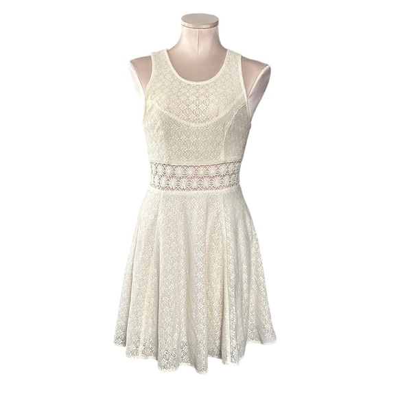 Free People ivory dress in size 0. See through design on waist. - Picture 12 of 12